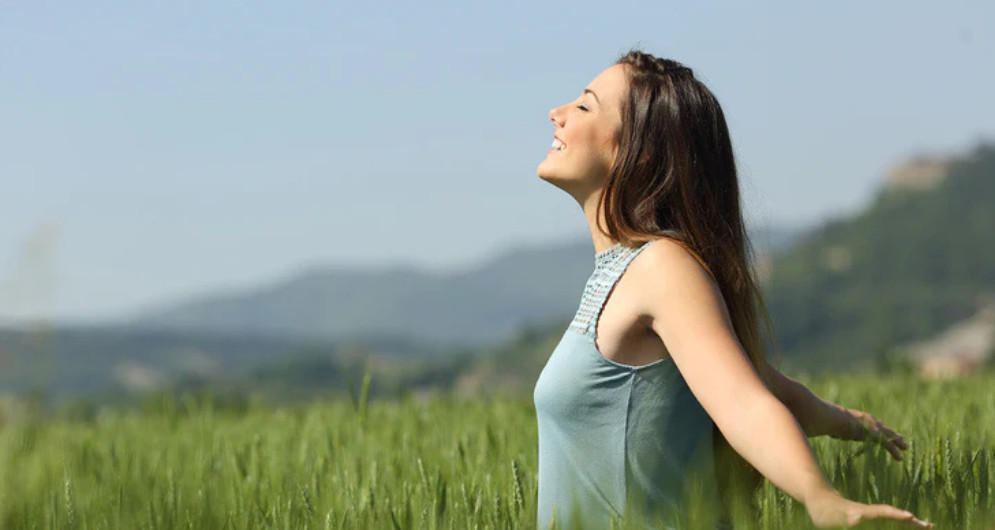 Woman outdoors in a mountain landscape