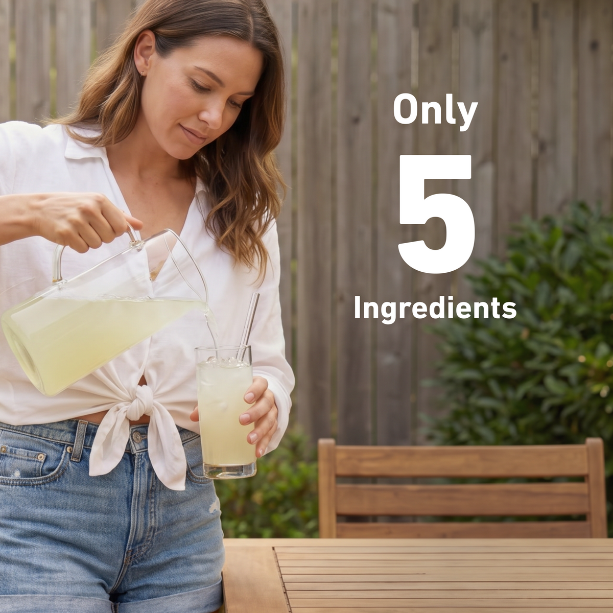 A woman in a white shirt and blue jeans pours a pale yellow drink from a glass pitcher into a glass tumbler outdoors. A wooden fence, bench, and greenery are in the background, with large white text reading 'Only 5 Ingredients'.