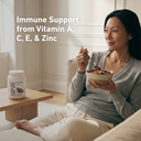 Woman enjoying an Isopure drink at home