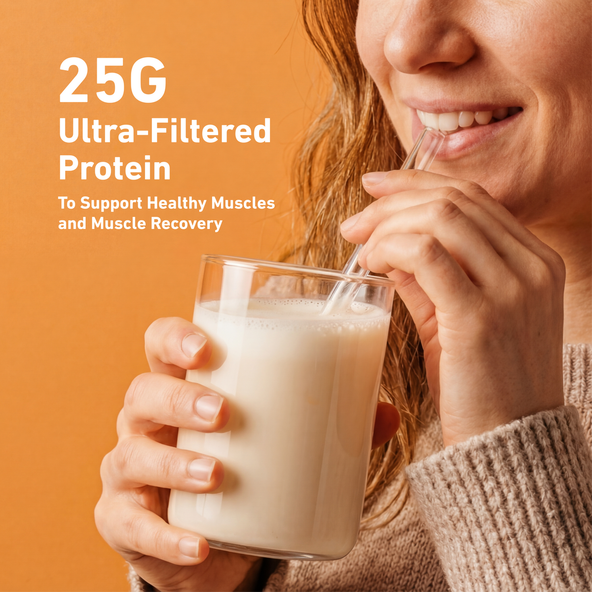 A woman holds a glass of creamy white protein drink with a straw against an orange background, with text reading '25G Ultra-Filtered Protein' and 'To Support Healthy Muscles and Muscle Recovery.'.