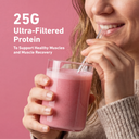Person holding a protein shake with text highlighting 25 grams of ultra-filtered protein